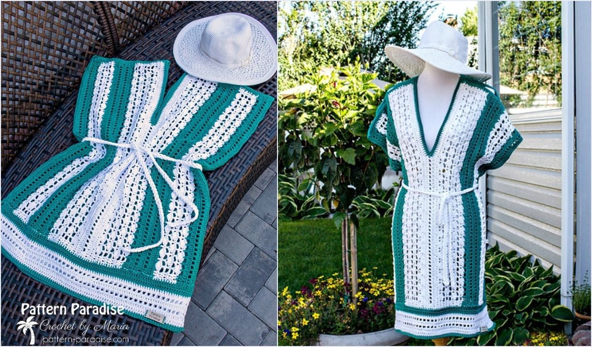 Displayed on a mannequin, this crocheted green and white cover-up comes with a tie belt that showcases a beautiful crochet pattern. A white sun hat adorns both the mannequin and a wicker seat, set against a backdrop of garden plants and a fence.